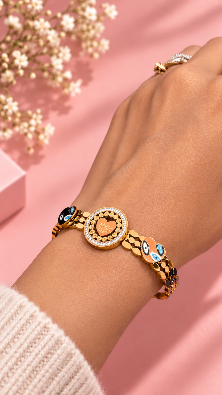 Evil Eye Stainless Steel Bangle – Gold-Tone Nazar Charm Bracelet — Gold-tone stainless steel evil eye bangle bracelet on wrist | Zohricanada — Zohricanada