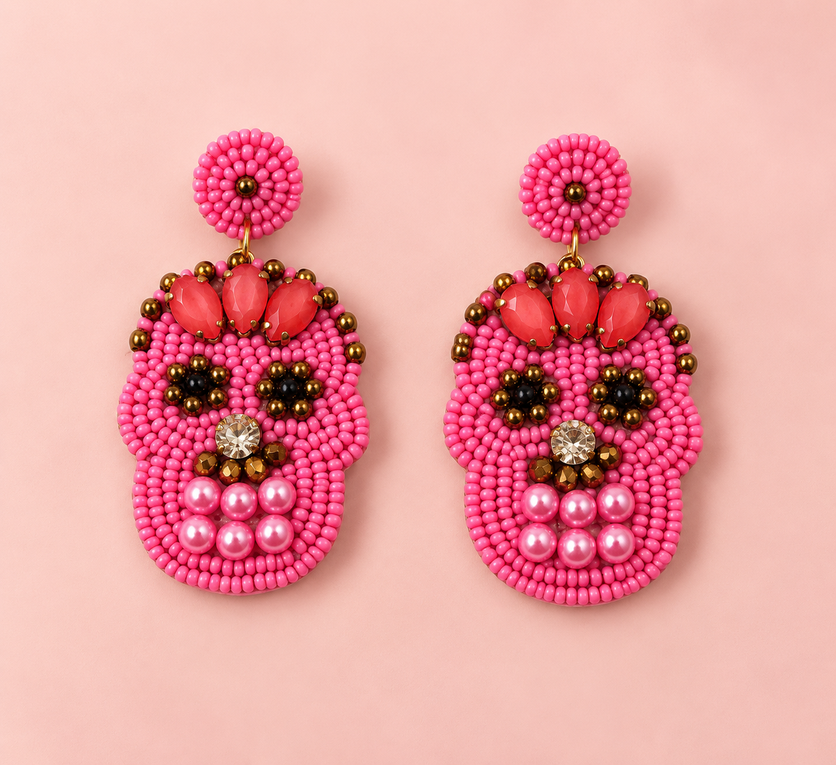 Handmade pink beaded sugar skull earrings | Zohricanada